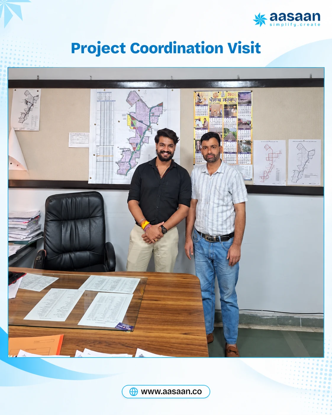 Aasaan branded office coordination visit with project drawings in the background.